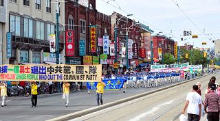 多倫多各界聲援一億中國人退出中共及其組織，舉辦遊行集會。