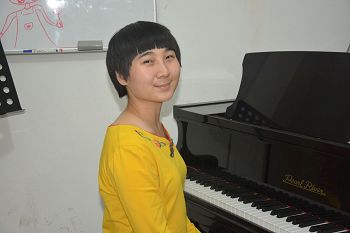 '修煉法輪功一年的北京鋼琴老師單珊近日被綁架'