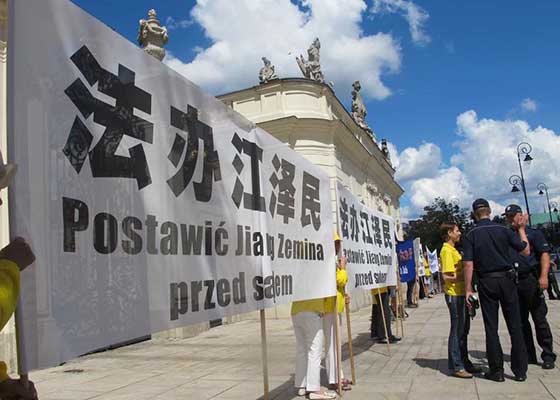 波蘭法輪功學員抗議張德江到訪（圖）