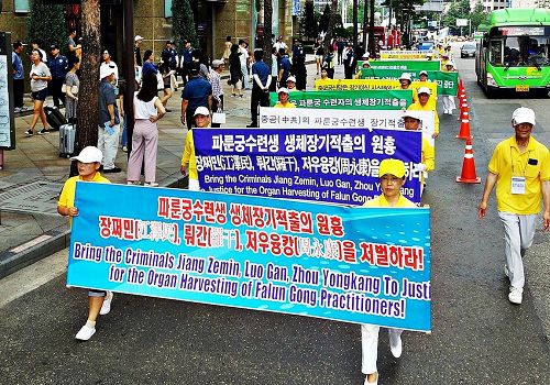 '圖7～12：韓國法輪功學員「七二零」反迫害遊行隊伍。'