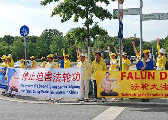 中國總理訪德 法輪功呼籲制止迫害