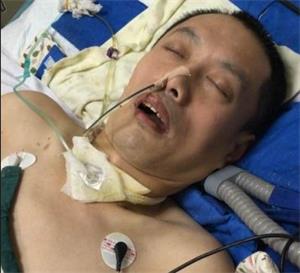 '胡國艦在本溪市中心醫院搶救，腳被銬在床頭'