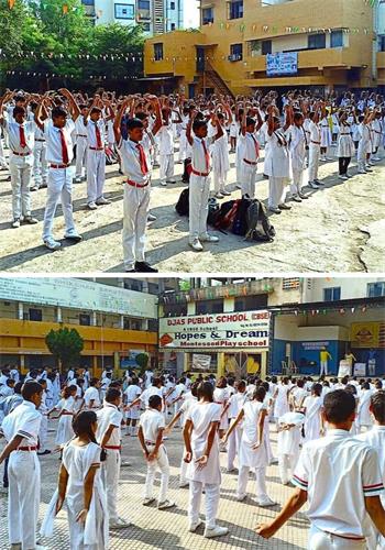 '圖1：二零一九年十月五日，印度中部城市納格普（Nagpur）的法輪功學員，在卡木納區久比特高中（Jupiter high school khamla Nagpur）教授法輪功功法，師生們認真學煉功法動作。'