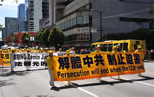 '圖8～13：2019年7月20日，溫哥華法輪功學員及支持者在溫哥華市中心繁華地帶遊行。'