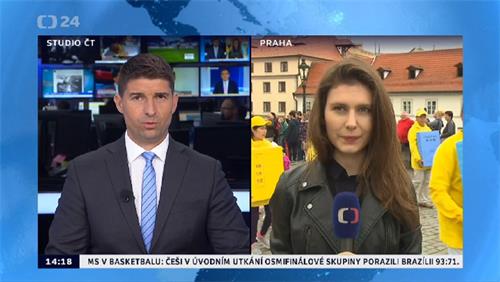 '圖7：捷克電視台CT24對法輪功遊行的盛況作了現場直播'