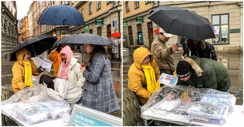 '圖3：明白了真相的瑞典民眾，冒雨用自己的簽名來表達支持法輪功學員反迫害'