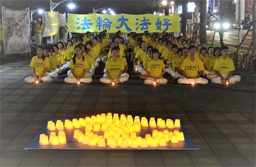 '圖1～3：二零二零年七月十一日下午，台灣屏東法輪功學員在遷徙公園舉辦燭光悼念會，追思被迫害致死的中國法輪功學員。'