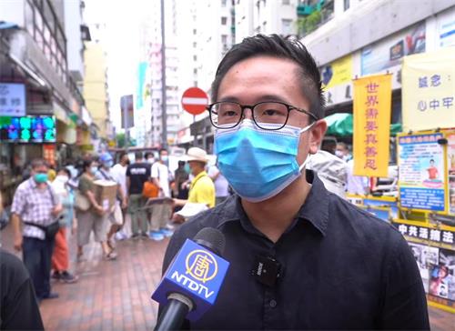 圖9：區議員利瀚庭也說，今天面對國安法的威脅，法輪功街站依然在屹立，我們香港人正是要以此為榜樣。