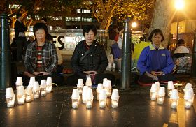 圖1-2：悉尼法輪功學員悼念被中共迫害致死的中國大陸同修