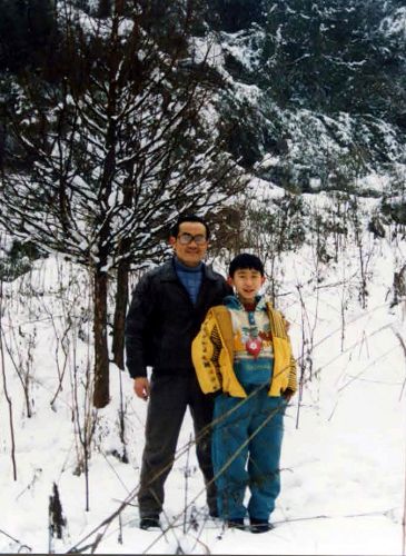 李喆小時和父親李曉波合影