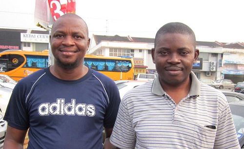 '來自尼日利亞的博士生納爾遜（左）和奧帕魯瓦﹒尤素夫（右）異口同聲表示遊行非常棒，希望能再有機會看到。'