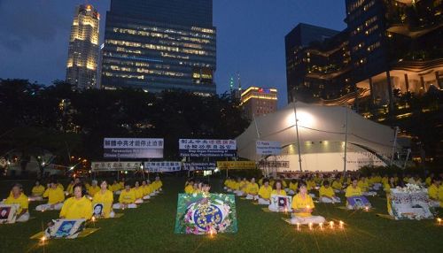 法輪功學員舉辦燭光夜悼活動，緬懷為堅守正信而失去生命的中國大陸同修。