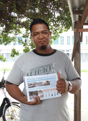 馬來居民阿米爾（Amil）對法輪功學員舉辦的中秋遊行表示喜歡。