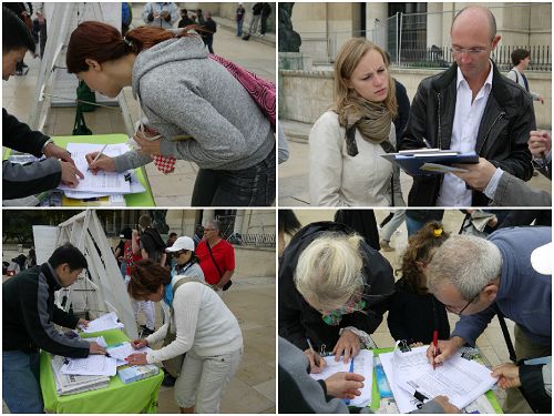 圖2-6：世界各地遊客和法國民眾認真簽名，表達支持法輪功反迫害的心聲