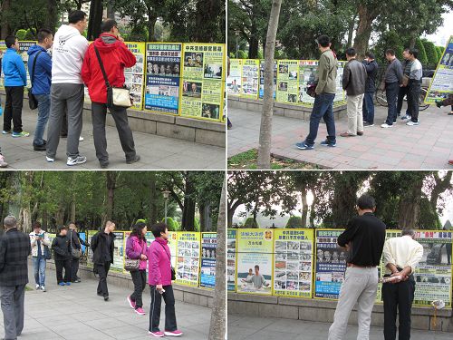 法輪功真相吸引民眾、尤其是中國大陸觀光客的關注，並駐足觀看真相。