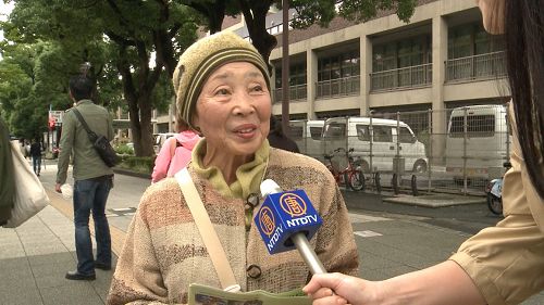 '圖8：一位日本老婆婆表示對迫害感到震驚'