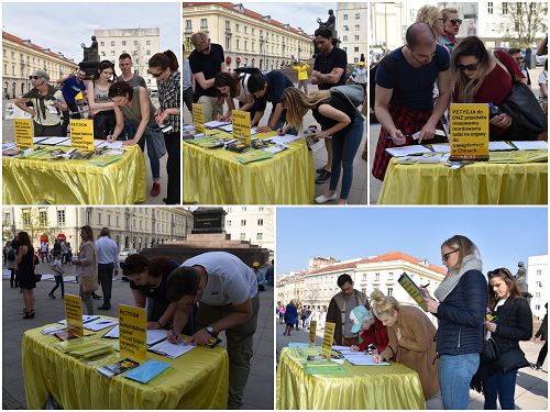 圖1：波蘭市民和遊客紛紛參加反對中共迫害法輪功的徵簽活動