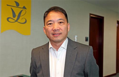 '圖8：香港立法會議員、民主黨主席胡志偉'