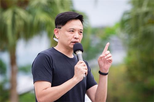 '圖7：台北市議員洪健益譴責中共罪行，呼籲國際關注中國人權問題。'