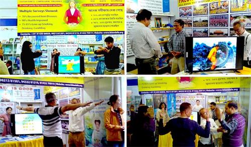 '圖1：印度法輪功學員在加爾各答國際書展上教功演示功法'