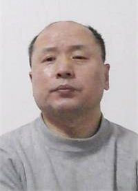 '瀋陽市47 歲的航空工程師、法輪功學員胡林'