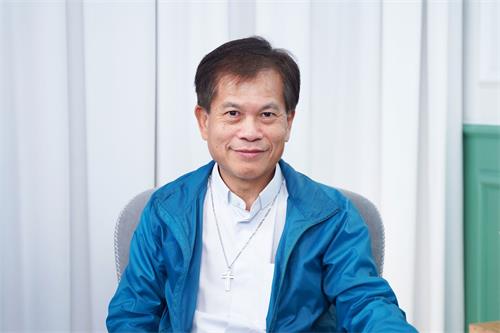 '圖1：香港聖公會牧師、前立法局議員馮智活'