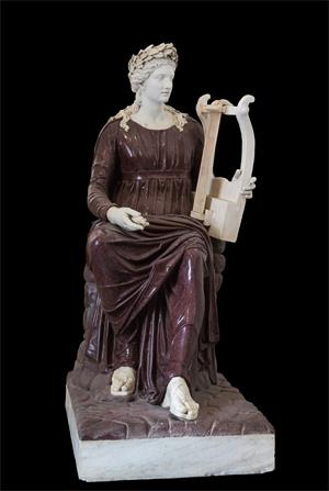 圖例：阿波羅持琴座像（Apollo seated with lyre），由斑岩和大理石製成，作於公元二世紀，現存於那不勒斯國立考古博物館。（網絡圖片）