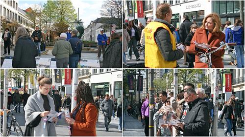 圖1～3：二零二二年四月九日，比利時法輪功學員在安特衛普市中心舉辦講真相活動，許多人駐足觀看、了解。