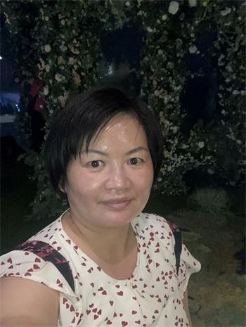 '圖1：家住台中的退黨義工燕玲。'